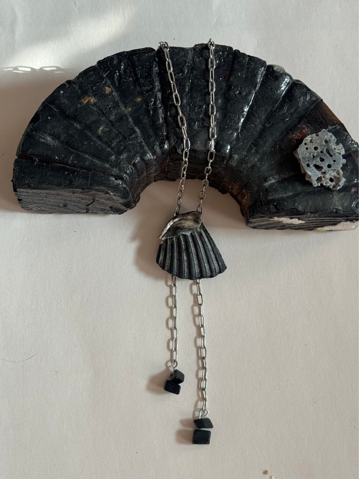 bolo necklace with black shell fragment charm 
